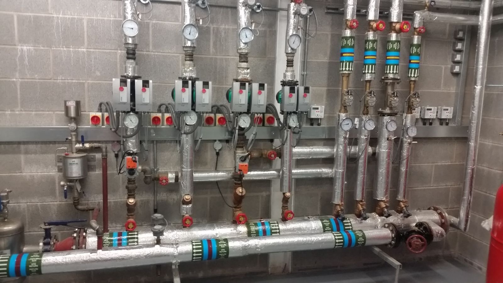 Plant room pipework and pumps installed at Glen Community Complex, Belfast